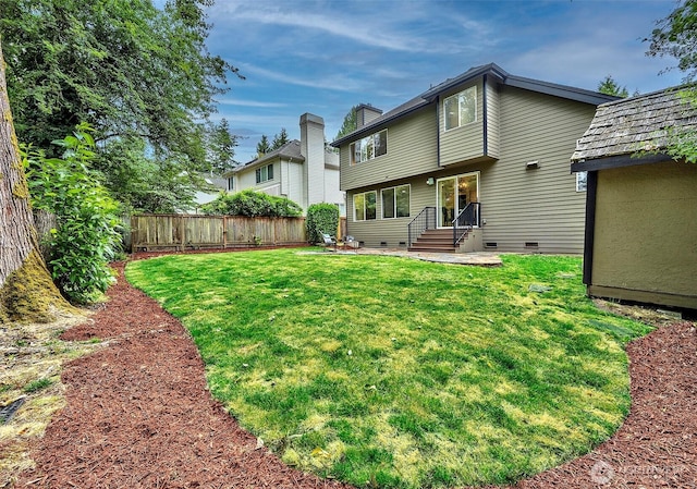 5044 157th Ct NE, Redmond, WA 98052 - rear view of property featuring a fenced backyard and crawl space