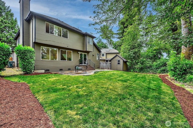 5044 157th Ct NE, Redmond, WA 98052 - rear view of house featuring a storage shed, a chimney, a patio area, a yard, and crawl space