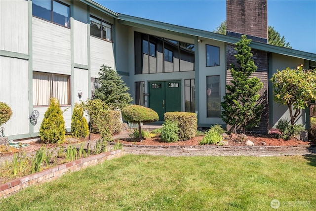 17 Jeffery Pl, Longview, WA 98632 - view of front of property with a chimney and a front yard