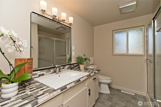 1136 Harding, Enumclaw, WA 98022 - full bath featuring a stall shower, vanity, and tasteful backsplash