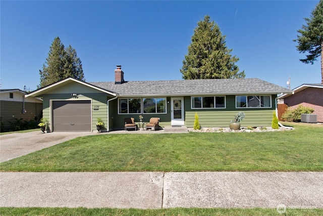 1136 Harding, Enumclaw, WA 98022 - ranch-style home with a chimney, an attached garage, a front yard, and driveway