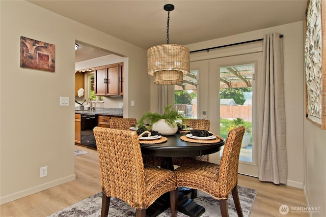 1136 Harding, Enumclaw, WA 98022 - dining room featuring light wood-style floors and baseboards