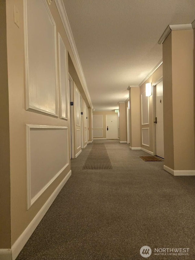 4540 8th Ave NE Unit 202, Seattle, WA 98105 - corridor with ornamental molding and carpet floors