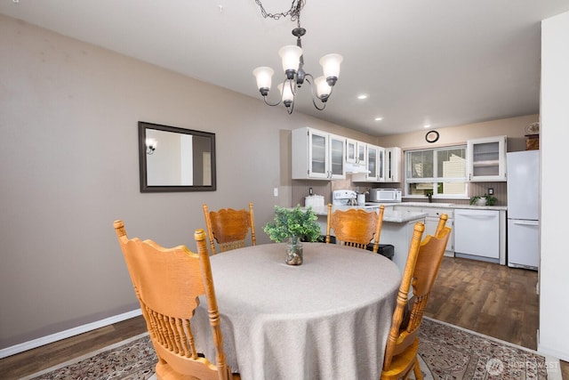 23430 100th Ave SE Unit E102, Kent, WA 98031 - dining area featuring a chandelier, dark wood finished floors, and recessed lighting