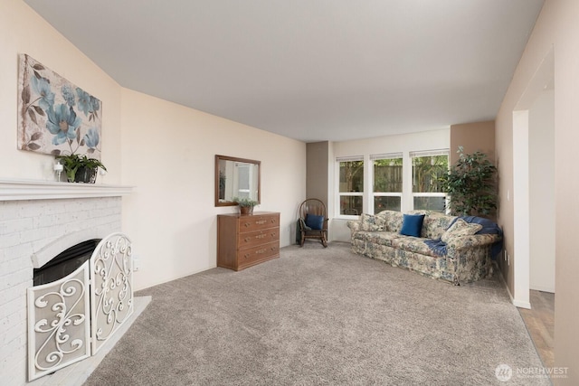 23430 100th Ave SE Unit E102, Kent, WA 98031 - living area featuring carpet floors and a fireplace