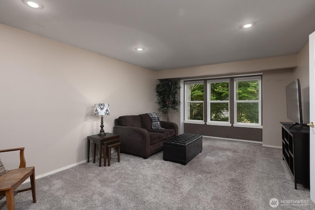 23430 100th Ave SE Unit E102, Kent, WA 98031 - carpeted living area with recessed lighting and baseboards