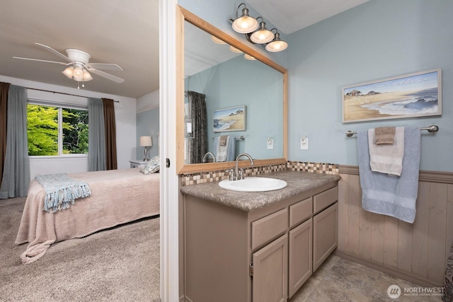23430 100th Ave SE Unit E102, Kent, WA 98031 - full bathroom featuring vanity, wainscoting, a ceiling fan, and ensuite bathroom