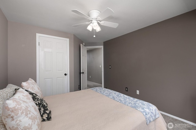 23430 100th Ave SE Unit E102, Kent, WA 98031 - carpeted bedroom featuring baseboards and ceiling fan