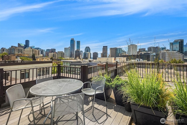 1610 Belmont Ave Unit 314, Seattle, WA 98122 - deck with a view of skyline and outdoor dining area