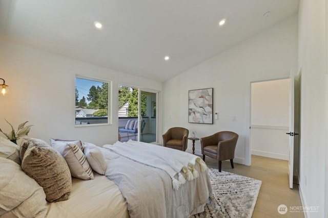 12046 5th Ave NE, Seattle, WA 98125 - bedroom with lofted ceiling, recessed lighting, light wood-type flooring, and access to exterior