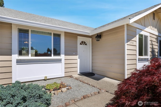 11950 SE 253rd St, Kent, WA 98030 - view of exterior entry featuring roof with shingles