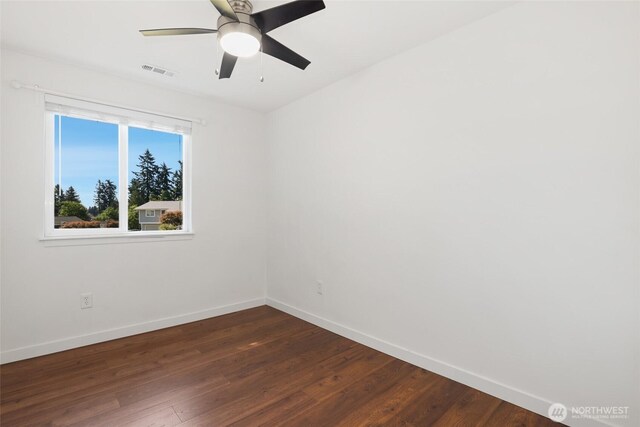 11950 SE 253rd St, Kent, WA 98030 - empty room featuring dark wood finished floors and ceiling fan