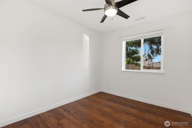 11950 SE 253rd St, Kent, WA 98030 - spare room featuring dark wood-style floors and a ceiling fan