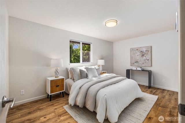 4133 23rd Ave SW, Seattle, WA 98106 - bedroom with wood finished floors and baseboards