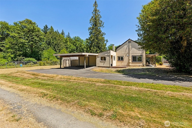 1524 26th Ave NE, Olympia, WA 98506 - view of front of house with a carport and driveway