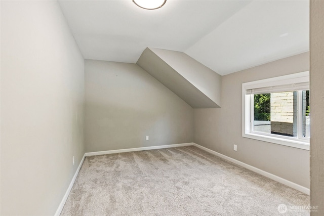 1524 26th Ave NE, Olympia, WA 98506 - bonus room featuring carpet floors and vaulted ceiling