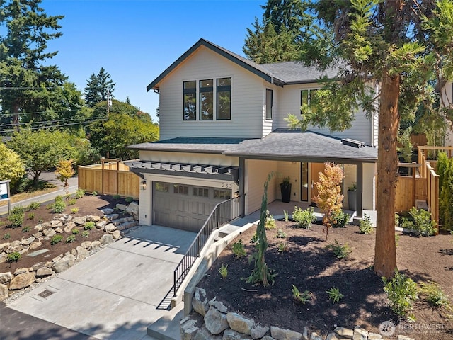 233 19th Ave, Kirkland, WA 98033 - view of front of property with a garage, concrete driveway, a porch, and a shingled roof