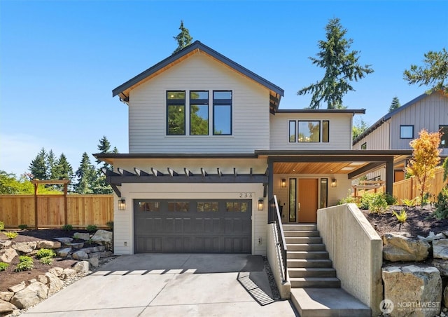 233 19th Ave, Kirkland, WA 98033 - view of front facade featuring a garage, driveway, and covered porch