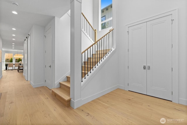 233 19th Ave, Kirkland, WA 98033 - stairway with hardwood / wood-style floors and recessed lighting
