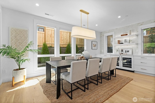 233 19th Ave, Kirkland, WA 98033 - dining area with wine cooler, light wood-style floors, and recessed lighting