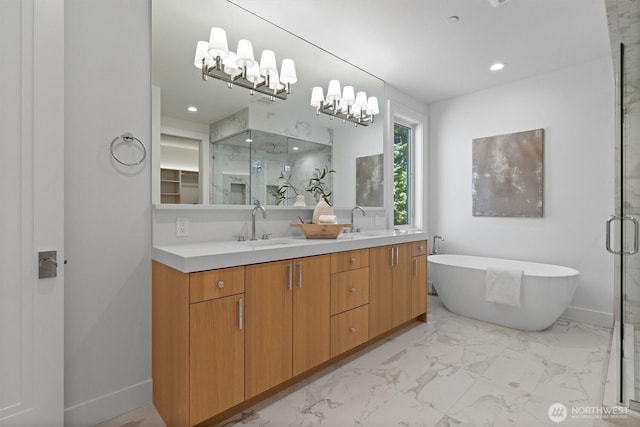 233 19th Ave, Kirkland, WA 98033 - bathroom featuring a marble finish shower, double vanity, marble look tile flooring, a freestanding tub, and recessed lighting