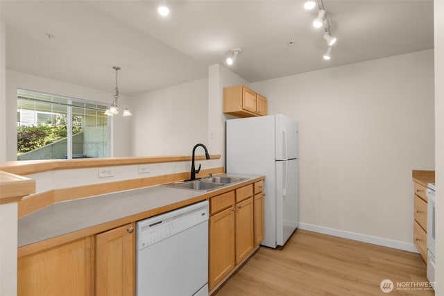 6409 Hazel Ln SE Unit H, Auburn, WA 98092 - kitchen with white appliances, light wood-type flooring, pendant lighting, a chandelier, and light countertops