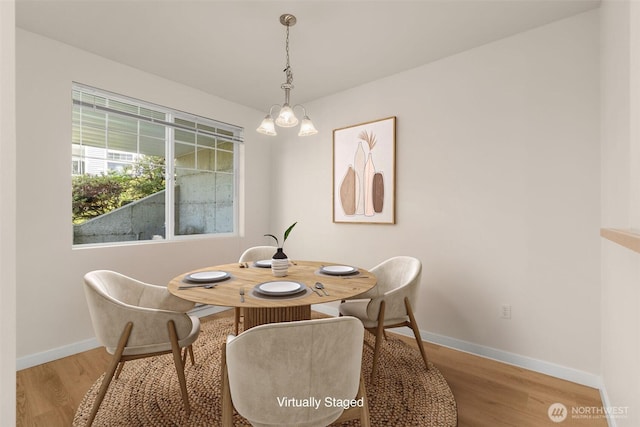 6409 Hazel Ln SE Unit H, Auburn, WA 98092 - dining space featuring light wood-type flooring and baseboards