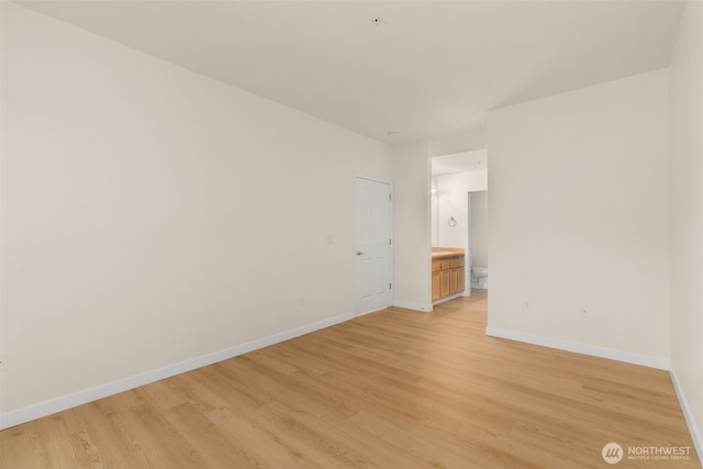 6409 Hazel Ln SE Unit H, Auburn, WA 98092 - empty room featuring light wood-type flooring and baseboards