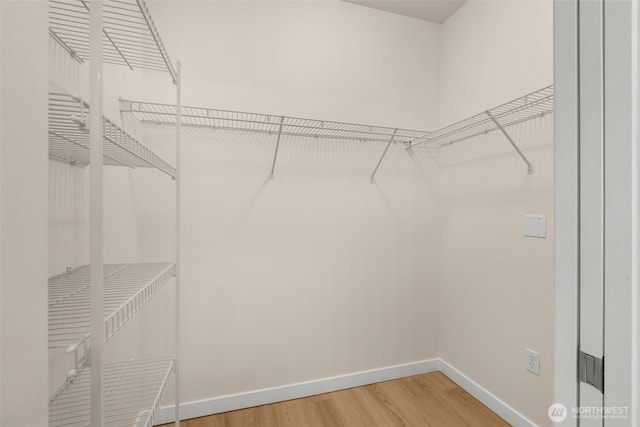 6409 Hazel Ln SE Unit H, Auburn, WA 98092 - spacious closet featuring light wood-type flooring