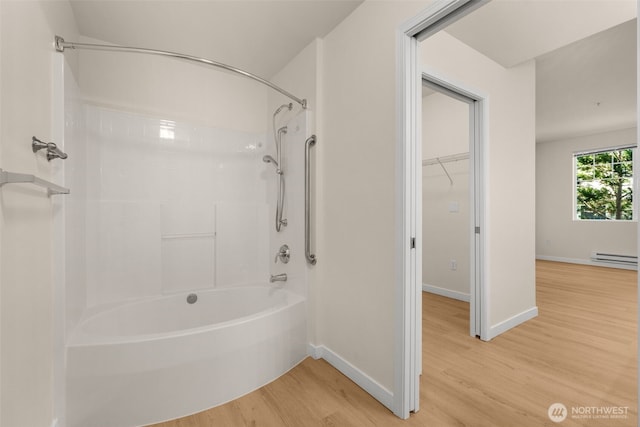 6409 Hazel Ln SE Unit H, Auburn, WA 98092 - full bathroom featuring wood finished floors, shower / bathtub combination, and baseboard heating