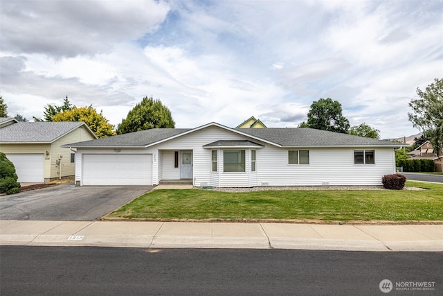 1312 Welch Ave, Wenatchee, WA 98801 - ranch-style home featuring driveway, a garage, and a front lawn