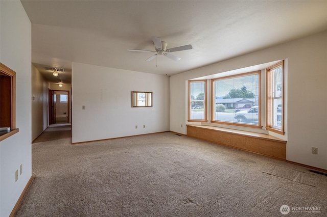 1312 Welch Ave, Wenatchee, WA 98801 - carpeted spare room with ceiling fan and plenty of natural light