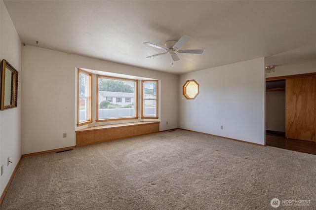 1312 Welch Ave, Wenatchee, WA 98801 - unfurnished bedroom featuring carpet, a closet, and ceiling fan