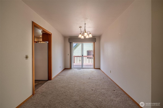 1312 Welch Ave, Wenatchee, WA 98801 - spare room with carpet floors and a chandelier