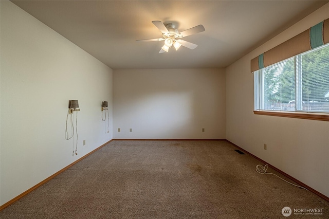 1312 Welch Ave, Wenatchee, WA 98801 - carpeted spare room featuring a ceiling fan and baseboards