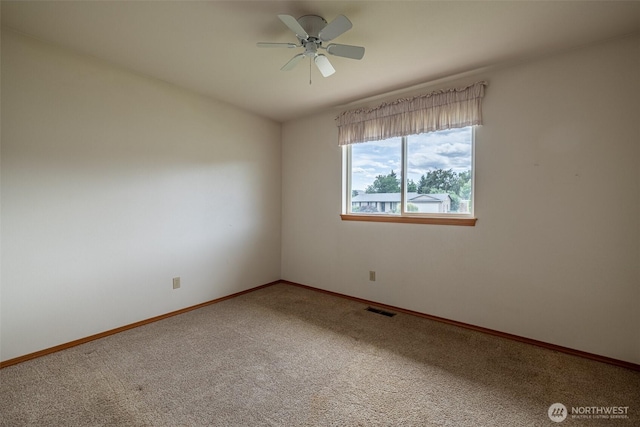 1312 Welch Ave, Wenatchee, WA 98801 - carpeted spare room with a ceiling fan and baseboards