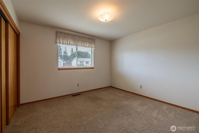 1312 Welch Ave, Wenatchee, WA 98801 - unfurnished bedroom with light colored carpet and a closet
