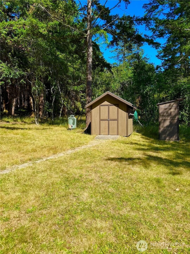 108 N Airport Way, Friday Harbor, WA 98250 - view of green lawn featuring a storage shed