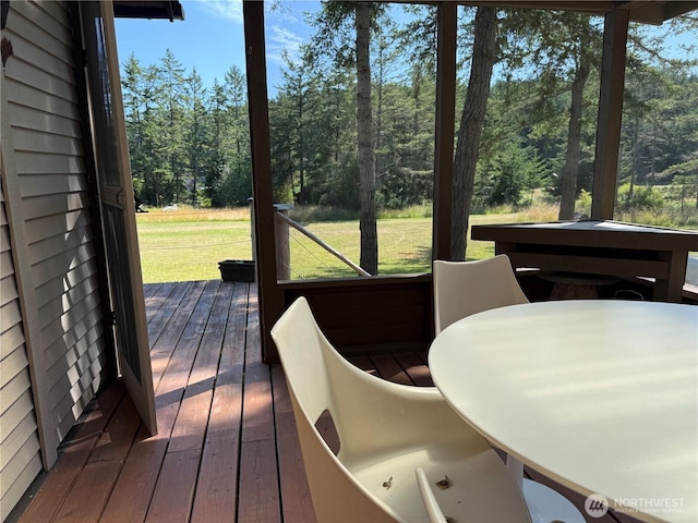108 N Airport Way, Friday Harbor, WA 98250 - deck featuring a yard, view of scattered trees, and outdoor dining area