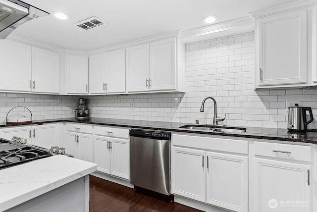 1501 58th Ave NE, Tacoma, WA 98422 - kitchen with stainless steel dishwasher, white cabinets, decorative backsplash, dark stone counters, and dark wood finished floors