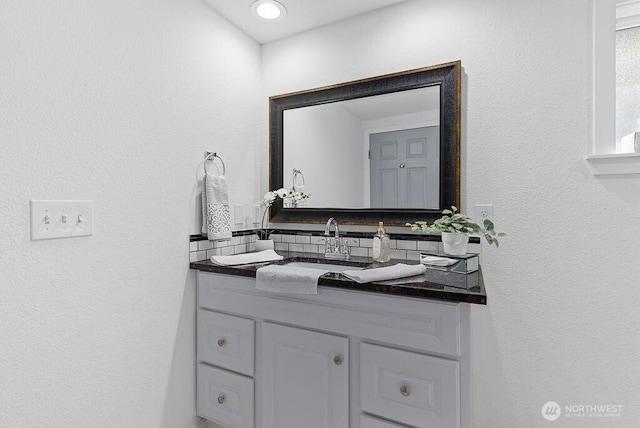 1501 58th Ave NE, Tacoma, WA 98422 - bathroom with vanity and tasteful backsplash