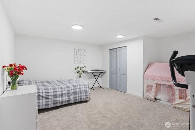 1501 58th Ave NE, Tacoma, WA 98422 - bedroom featuring carpet flooring and a closet