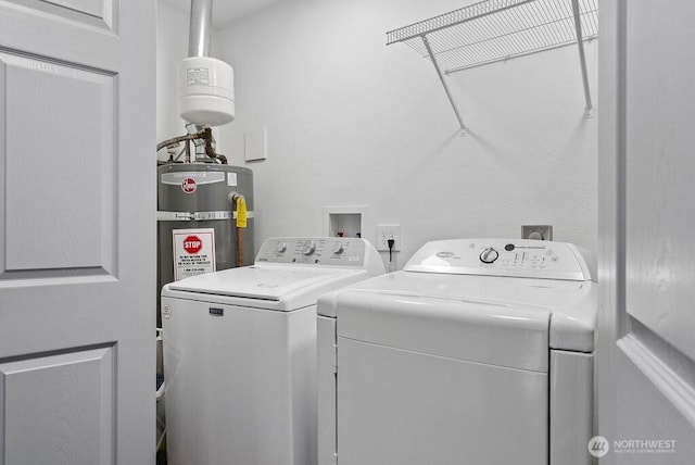 1501 58th Ave NE, Tacoma, WA 98422 - laundry room with washing machine and clothes dryer and strapped water heater