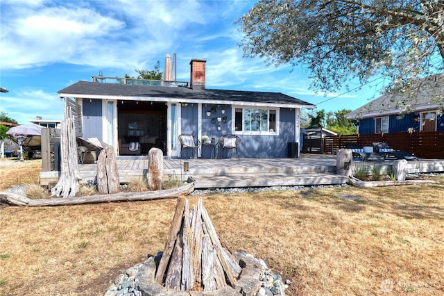 724 Walters Ln, Point Roberts, WA 98281 - back of house featuring a chimney and a deck