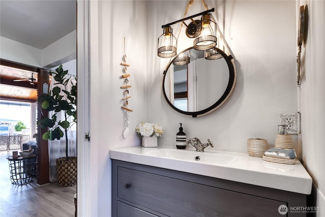 724 Walters Ln, Point Roberts, WA 98281 - bathroom featuring vanity, wood finished floors, and a ceiling fan