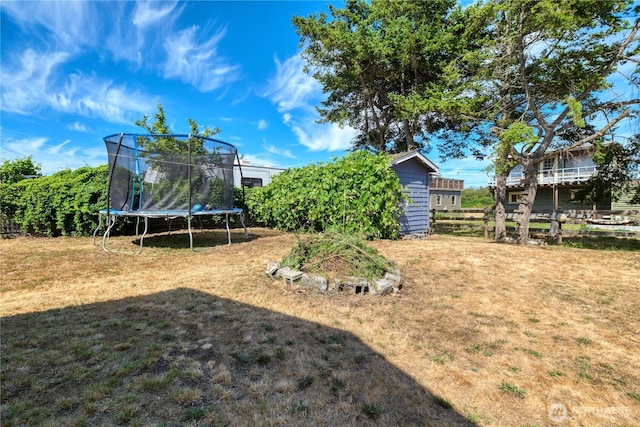 724 Walters Ln, Point Roberts, WA 98281 - view of yard featuring a trampoline and an outbuilding