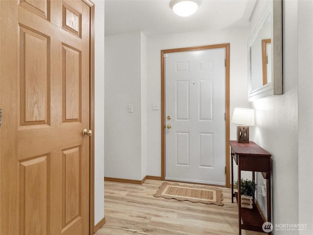 15428 Bornstein Ln SE, Yelm, WA 98597 - foyer with light wood-style floors and baseboards