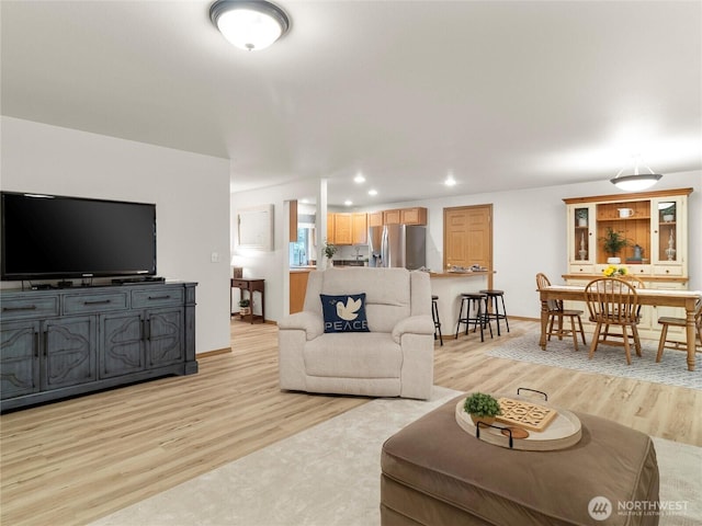 15428 Bornstein Ln SE, Yelm, WA 98597 - living room with light wood-type flooring and recessed lighting