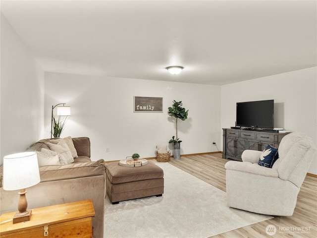 15428 Bornstein Ln SE, Yelm, WA 98597 - living area with wood finished floors and baseboards