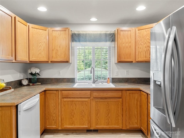 15428 Bornstein Ln SE, Yelm, WA 98597 - kitchen featuring stainless steel fridge, white dishwasher, and recessed lighting